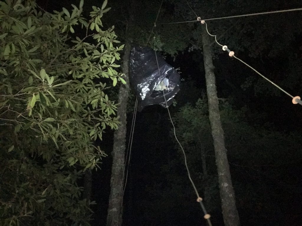 Hanging the pack, in the dark